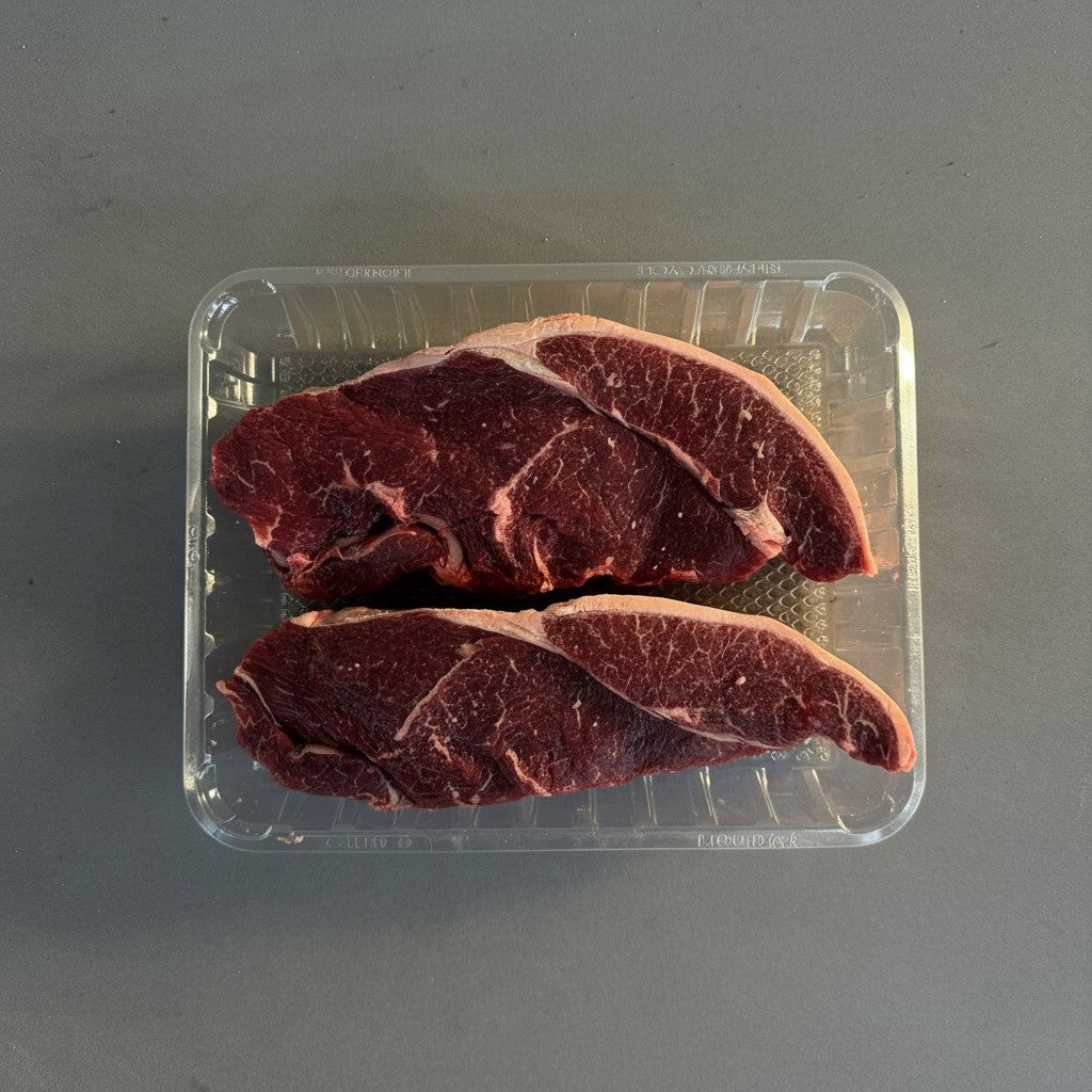 Alpha Fresh two raw Diamantina Wagyu rump steaks with MB3+ marbling in a clear plastic tray