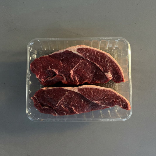 Alpha Fresh two raw Diamantina Wagyu rump steaks with MB3+ marbling in a clear plastic tray